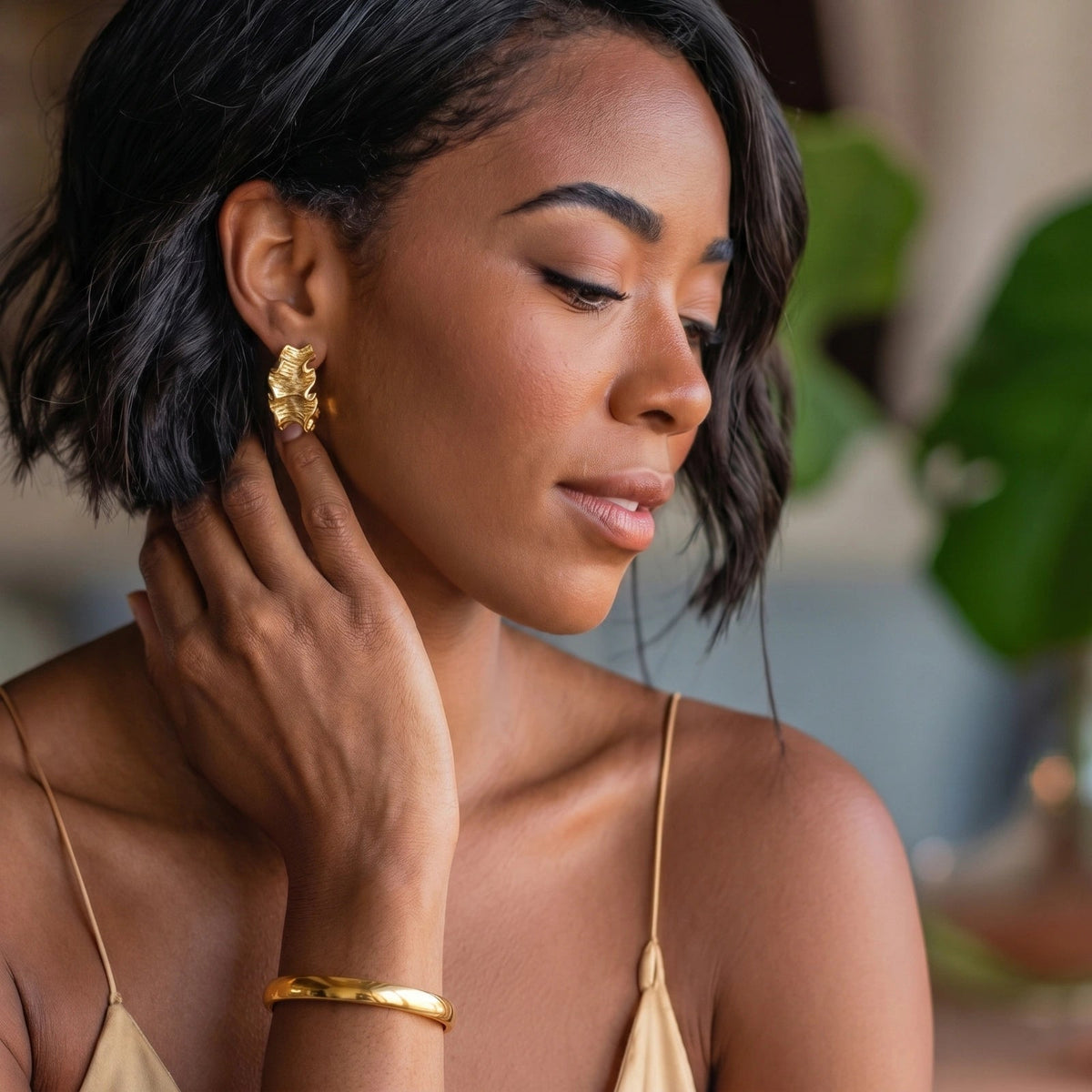 The Bold Hinge Bangle in 18K gold-plated stainless steel, alternate product view.